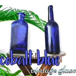 2 vintage collectible cobalt blue glass bottles